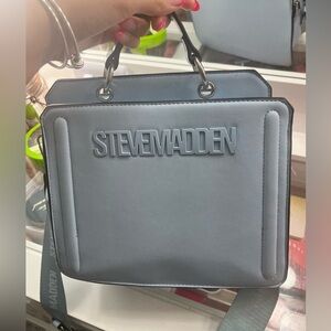 Viral Evelyn Steve Madden purse in baby blue.